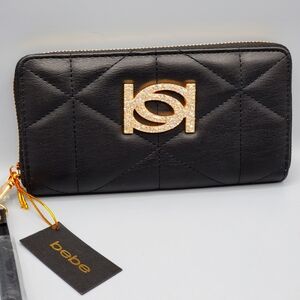 BEBE BLACK QUILTED ZAZA DIAMONDS, ZIP AROUND WALLET GOLDEN AND BLACK NWT